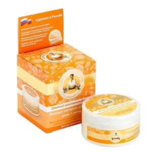 narandžasto pakovanje naspram kutije dvostruke kreme za lice dan-noć brenda "Recepti bake Agafije", 100ml