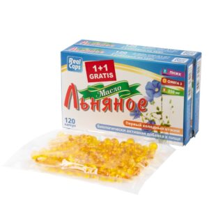 dve kutije sa žigom 1+1 gratis ispred kojih se nalaze kapsule ulja lanenog ulja